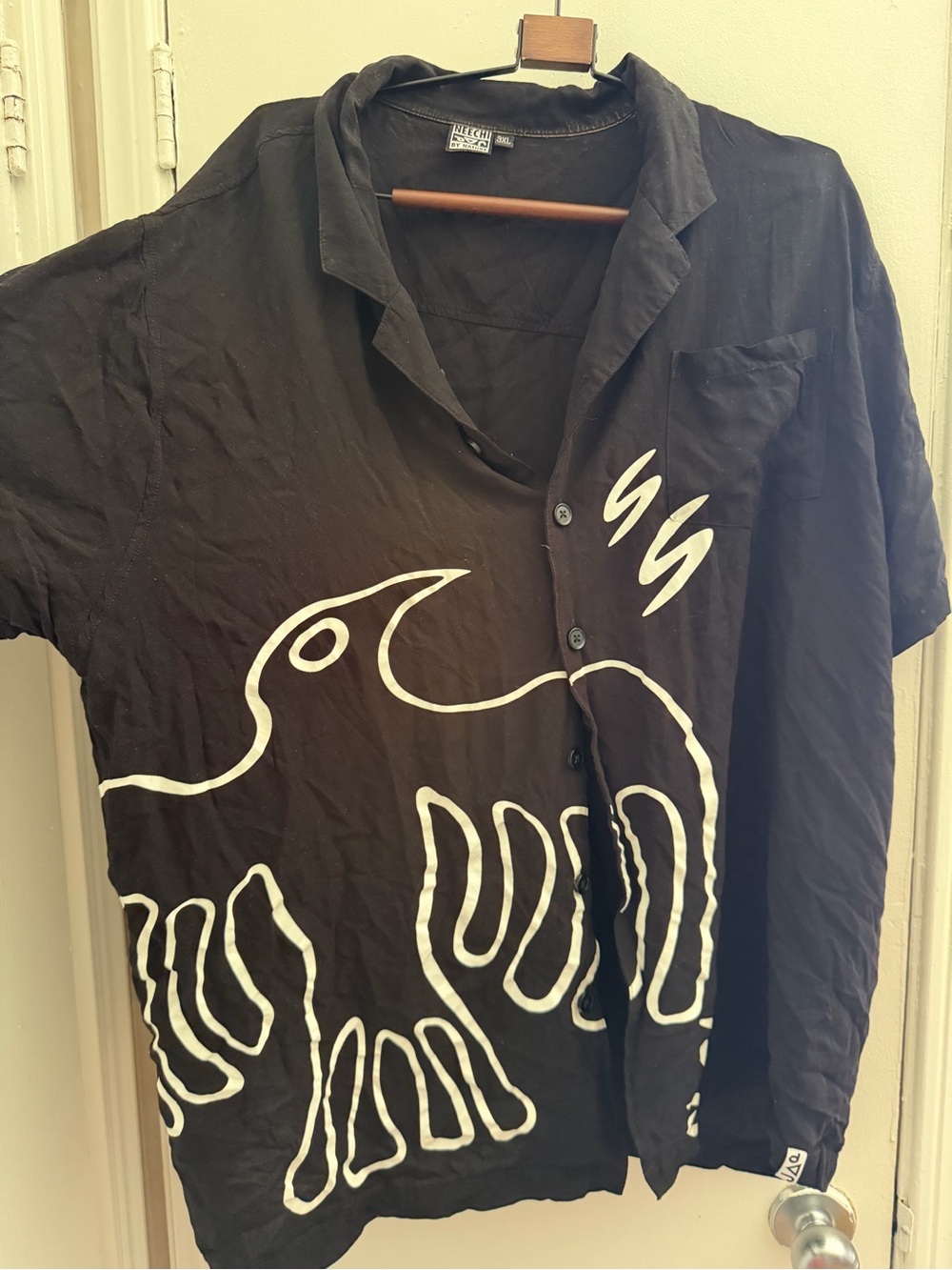 Black Button-Up Shirt with White Graphic Bird Design